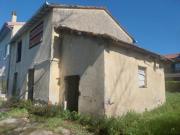 Casa affiancata da ristrutturare con terreno
