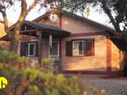 CASA AMOBLADA EN UN LOTE DE 1.000 m²