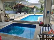 Casa Ampla com 4 Suítes no Condomínio Iolanda Taboão da...