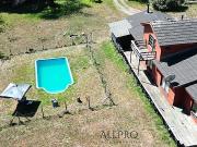 CASA AMPLIA, 2 CABAÑAS Y GALPÓN, SECTOR CANDELARIA