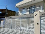 Casa charmosa em condomínio fechado na Praia Grande, 2...