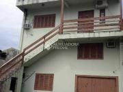 Casa com 03 dormitório