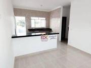 Casa com 2 dormitórios à venda, 63 m² por R$ 310.000,00...