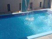 Casa com 2 dormitórios à venda, 94 m² por R$ 569.900,00...