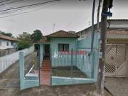 Casa com 3 dormitórios à venda, 150 m² por R$...