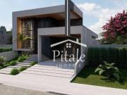 Casa com 3 dormitórios à venda, 154 m² por R$...