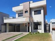 Casa com 3 dormitórios à venda, 180 m² por R$...
