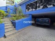 Casa com 3 dormitórios à venda, 180 m² por R$...
