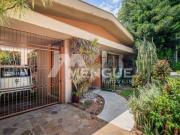 Casa com 3 dormitórios e 4 vagas de garagem à venda no...