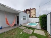 CASA COM 3 DORMITÓRIOS E PISCINA