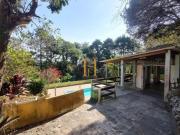 Casa com 3 suítes no condomínio Alpes da Cantareira