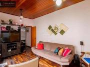 Casa com 4 dormitórios à venda, 166 m² por R$...