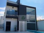 Casa com 4 dormitórios à venda, 180 m² por R$...