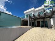 Casa com 4 dormitórios à venda, 180 m² por R$...