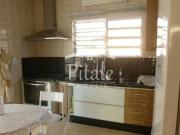 Casa com 4 dormitórios à venda, 200 m² por R$...