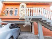 Casa com 4 dormitórios à venda, 212 m² por R$...