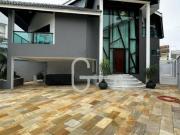 Casa com 4 dormitórios à venda, 250 m² por R$...