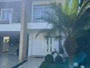 Casa com 4 dormitórios à venda, 261 m² por R$...