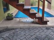 Casa com 4 dormitórios à venda, 290 m² por R$...