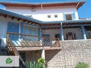 Casa com 4 dormitórios à venda, 290 m² por R$...