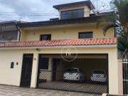 Casa com 4 dormitórios à venda, 293 m² por R$ 980.000,00...