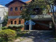Casa com 4 dormitórios à venda, 355 m² por R$...