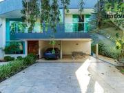 Casa com 4 dormitórios à venda, 390 m² por R$...