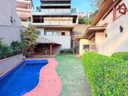 Casa com 4 dormitórios à venda, 410 m² por R$...