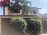 Casa com 4 dormitórios à venda, 473 m² por R$...