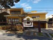 Casa com 4 dormitórios à venda, 496 m² por R$ 2.100.000...