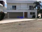 Casa com 4 dormitórios à venda, 596 m² por R$...