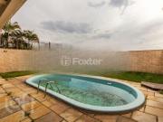 Casa com 4 dormitórios em Porto Alegre