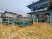 Casa com 4 dormitórios em Porto Alegre