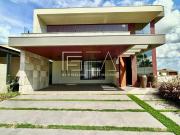 CASA COM 4 SUÍTES, MOBILIADA E DECORADA NO CONDOMÍNIO...