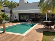 Casa com 4 suítes à venda, 431 m² por R$ 3.290.000...