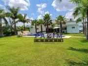 Casa com 4 suítes à venda, 482 m² Condomínio Parque da...