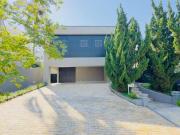 Casa com 4 Suítes à venda, 636 m² por R$ 2.990.000 Golf...