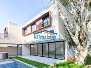 Casa com 4 Suítes e 487m² no Condomínio Garda Jardim...