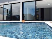 Casa com 4 suítes e Piscina
