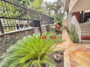 Casa com 5 dormitórios para alugar, 240 m² por R$...