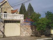 Casa com 5 dormitórios à venda, 200 m² por R$ 580.000...