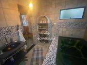 Casa com 5 dormitórios à venda, 240 m² por R$...