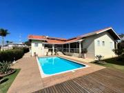 Casa com 5 dormitórios à venda, 250 m² por R$...