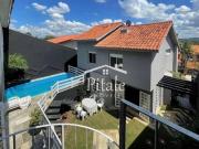 Casa com 5 dormitórios à venda, 340 m² por R$...