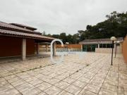 Casa com 5 dormitórios à venda, 400 m² por R$...