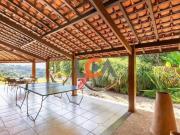 Casa com 5 dormitórios à venda, 400 m² por R$...