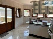 Casa com 5 dormitórios à venda, 420 m² por R$...