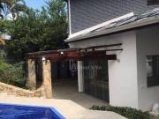 Casa com 5 dormitórios à venda, 448 m² por R$...