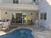 Casa com 5 dormitórios à venda, 450 m² por R$...