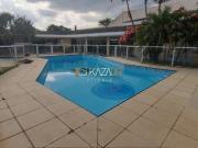 Casa com 5 dormitórios à venda, 774 m² por R$...